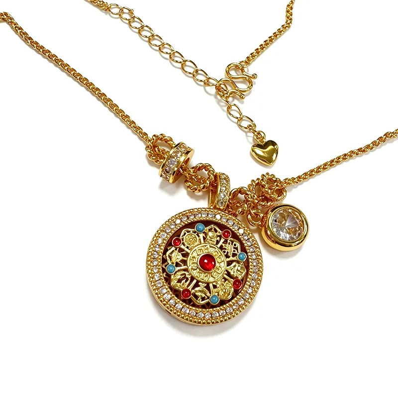 Close-up of the engraved gold medallion and enamel face